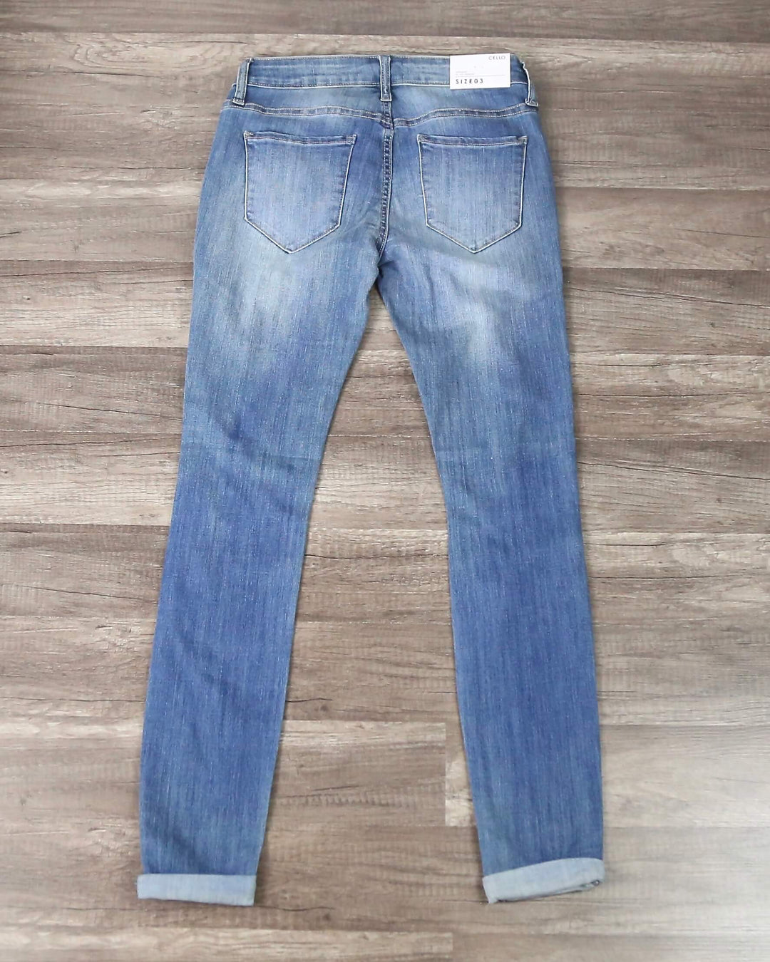 Victoria Destroyed Mid Rise Rolled Skinny in Medium Wash