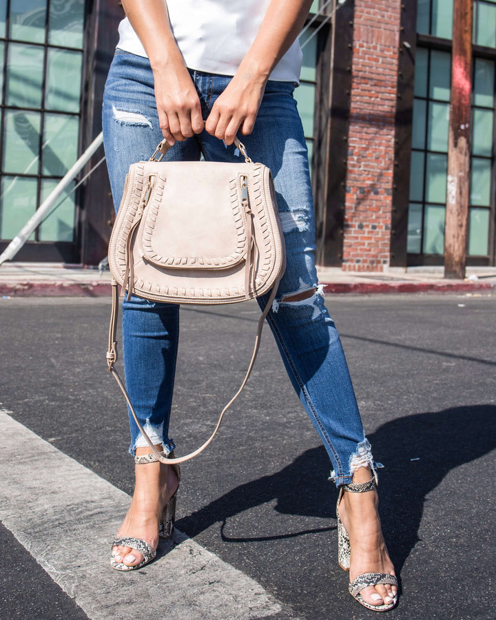 urban expression khloe saddle crossbody vegan leather handbag natural