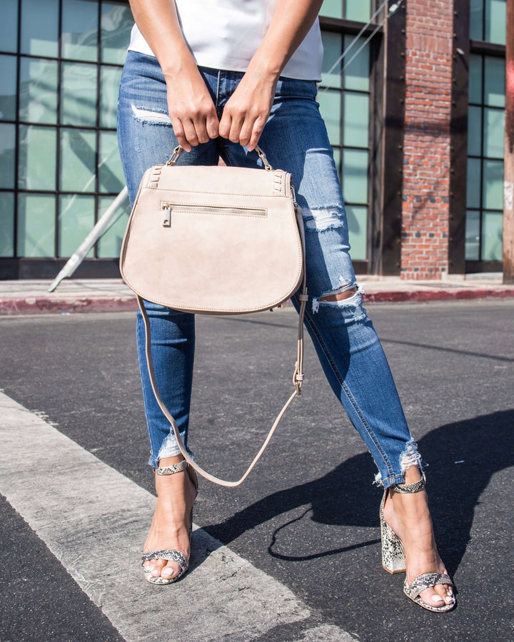urban expression khloe saddle crossbody vegan leather handbag natural