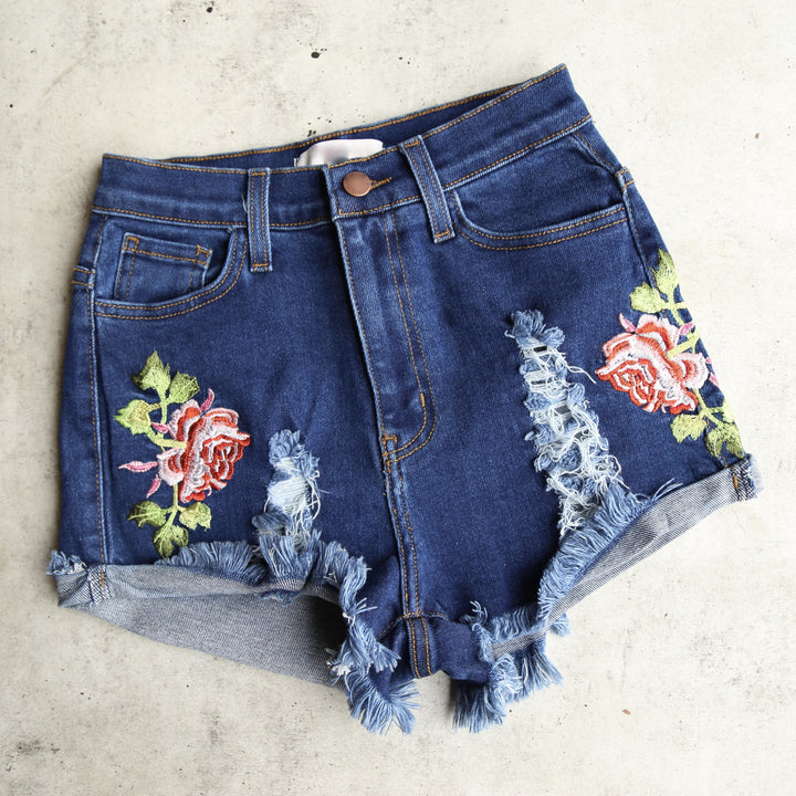 Final Sale - High Waisted Shredded Hot Shorts with Floral Applique in Dark Blue