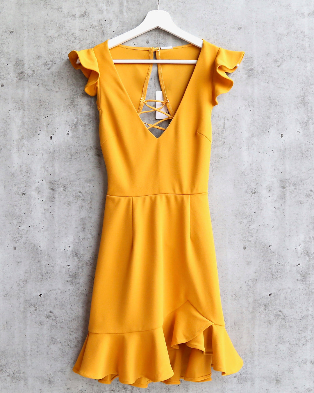 Girl Next Door Ruffle Sleeve Tie Back Mini Dress in Mustard