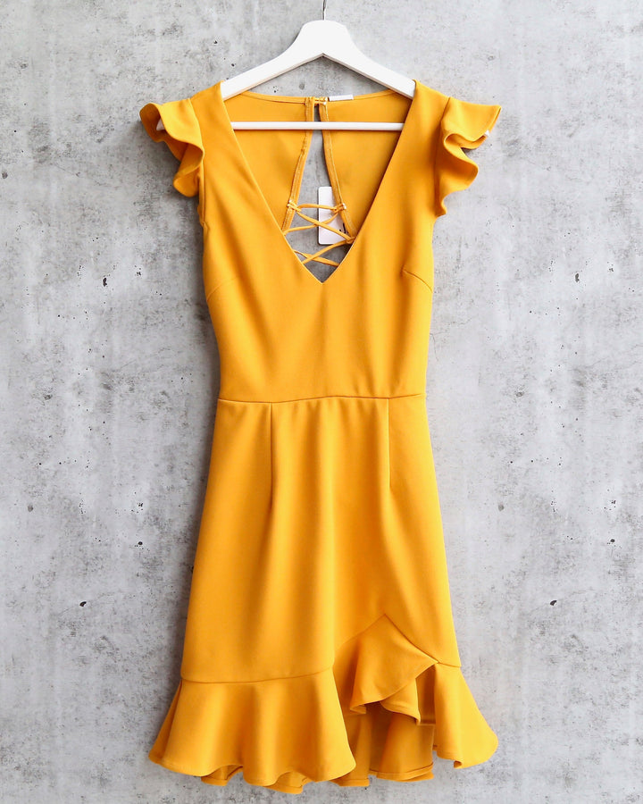 Girl Next Door Ruffle Sleeve Tie Back Mini Dress in Mustard