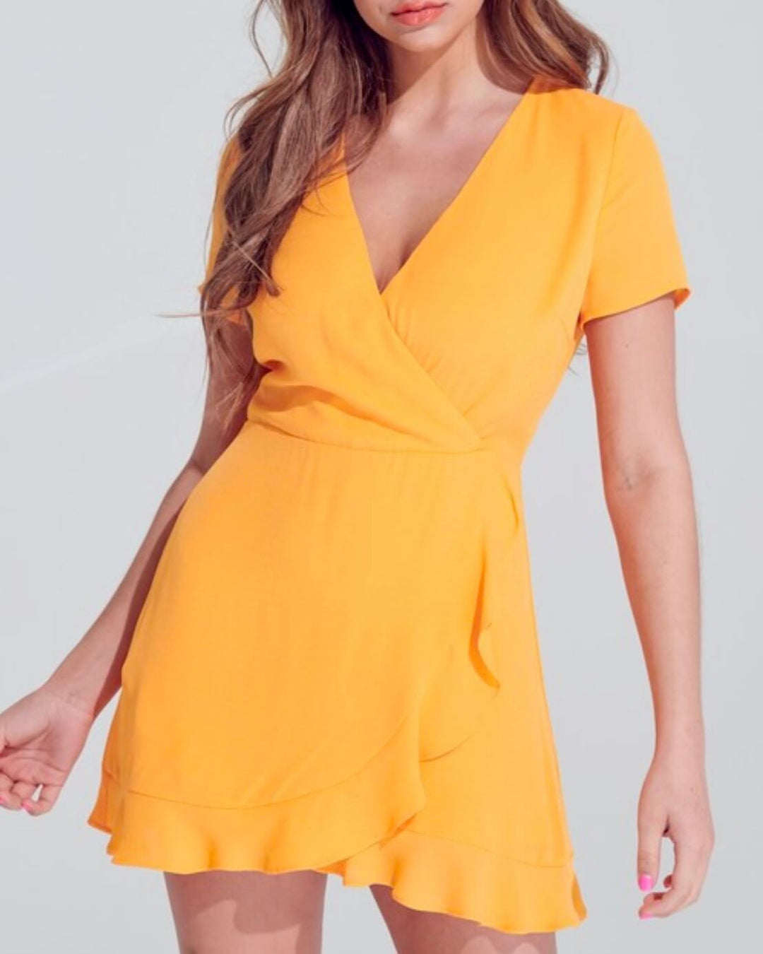 Wild Tangerines Faux Front Wrap Mini Dress with Ruffled Hem